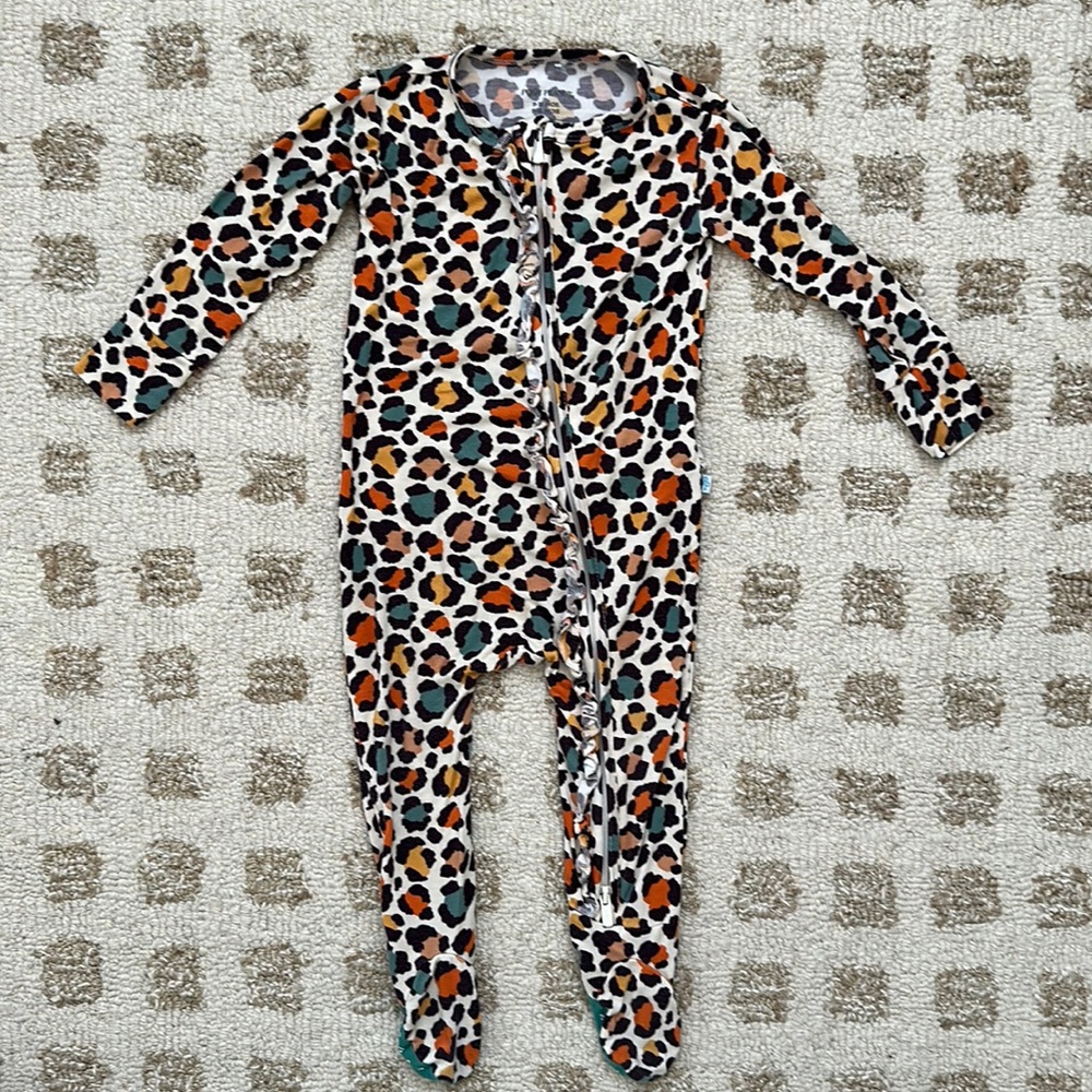 Posh Peanut Leopard Print Footed Pajamas in White, Orange, Teal, Black